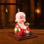 Solar Power Moving Head Buddha Statue Car Ornament (1 Pc  Mix Color)